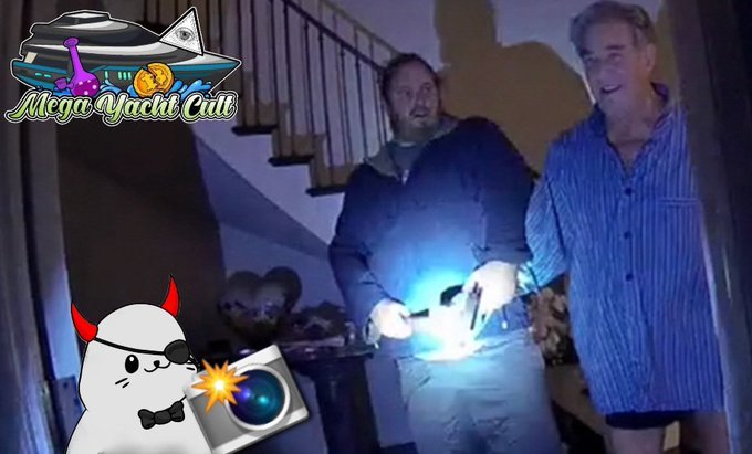 A grainy video still from 'Mega Yacht Cult' showing two men indoors, one holding a flashlight, with a cartoon devil cat character taking a photo in the foreground and the show's logo in the upper left corner.