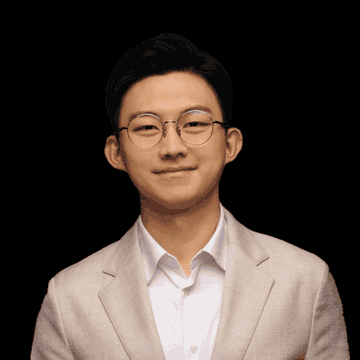 The image shows a headshot of a man with short black hair and round glasses, wearing a light beige suit jacket over a white shirt, smiling against a dark background. The accompanying post suggests this is Ki Young Ju, the founder of CryptoQuant, who commented on institutional investors viewing Bitcoin favorably.