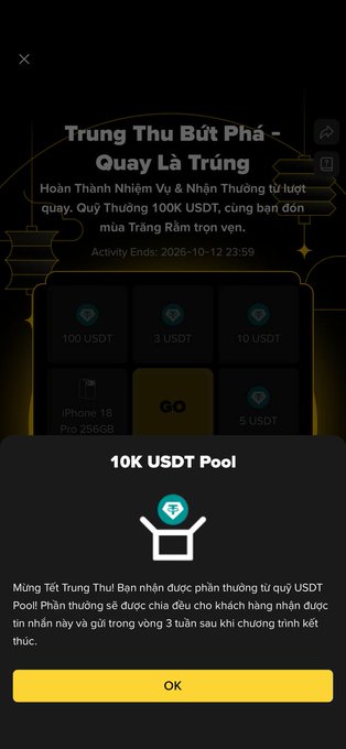A mobile app screen showing a Mid-Autumn Festival ('Trung Thu Bùt Phá - Quay Là Trúng') promotional event with a 10K USDT prize pool and reward options like 100 USDT or an iPhone 18 Pro 256GB.