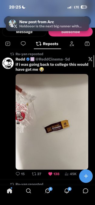 A mobile screenshot of a X/Twitter repost from @ReddCinema showing a photograph of a fast food bag and a receipt, with the caption 'if i was going back to college this would have got me'.