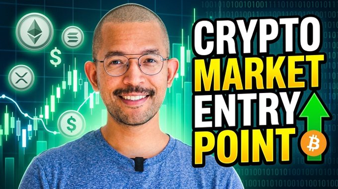 A smiling man with glasses stands before a background of cryptocurrency charts and coin icons (including Bitcoin, Ethereum, and XRP), with bold text reading "CRYPTO MARKET ENTRY POINT" and a green upward arrow, visually supporting the post's claim of bullish signals and a potential major market shift.