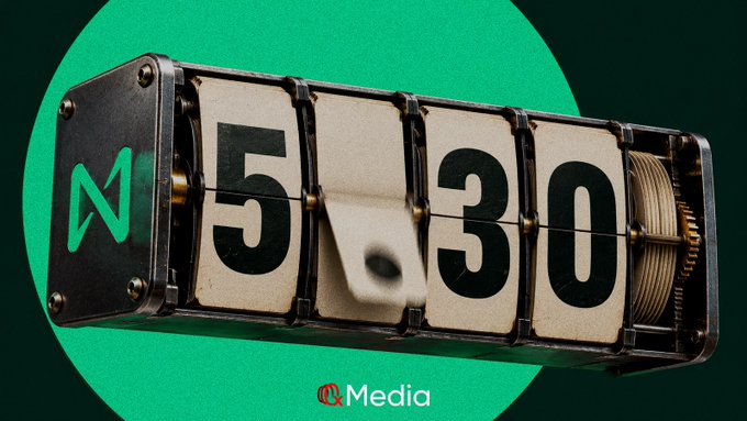 A retro flip-clock style graphic with the text 'GMEZO' on a green circular background, featuring a stylized 'M' logo and 'Media' watermark.
