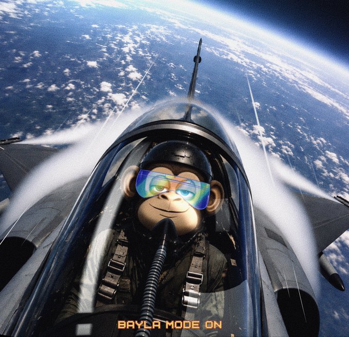 An anthropomorphic BAYLA monkey character, wearing a pilot helmet with rainbow reflective goggles and an oxygen mask, sits in the cockpit of a fighter jet soaring high above the Earth's clouds. The caption "BAYLA MODE ON" appears at the bottom, matching the post's vibe of "Acutely focused but also vibing. $BAYLA."