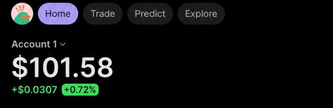 The image shows a trading app interface with an "Account 1" balance of **$101.58**, displaying a gain of **+$0.0307 (+0.72%)** in green, alongside navigation tabs for Home, Trade, Predict, and Explore. This screenshot illustrates the poster's claim of turning $1 into $100, marking the milestone of crossing the $100 profit threshold on their degen trading journey.