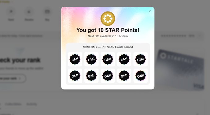 A digital reward popup reading 'You got 10 STAR Points!' showing 10 GMI tokens earned, with a note that the next GM is available in 15 hours 50 minutes.