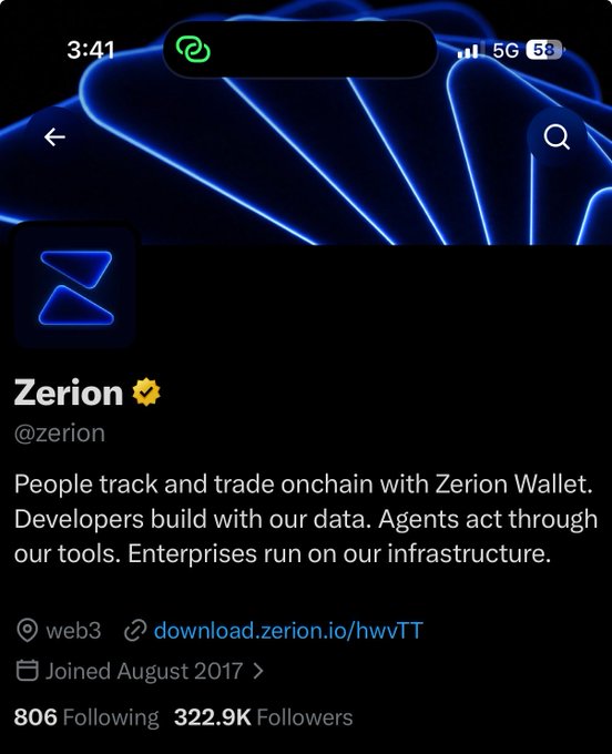 A Twitter/X profile page for Zerion (@zerion), a web3 platform, with 806 following and 322.9K followers, featuring a blue wave background and a bio about tracking and trading onchain.