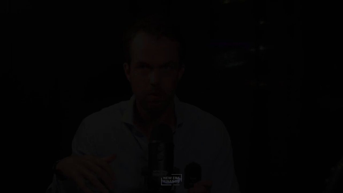 The image shows a man wearing glasses standing in front of a microphone with a black background. The man appears to be speaking into the microphone or presenting something related to cryptocurrency. The caption above him reads "CryptoPunks is a better levered bet on Ethereum than Ethereum itself." This suggests that the man might be discussing the potential benefits and risks associated with investing in Bitcoin, Ethereum, or other cryptocurrencies.