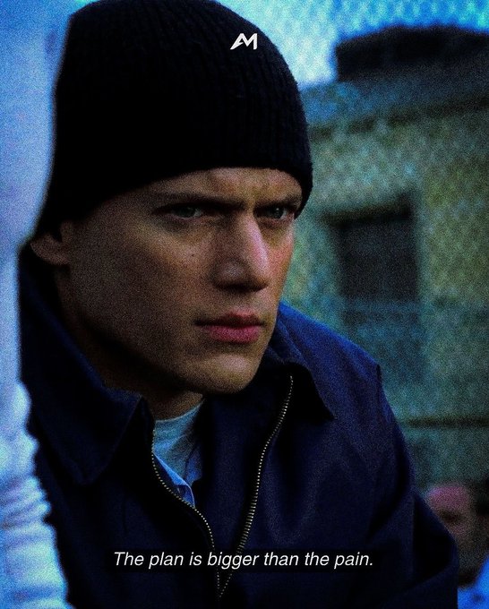 A moody portrait of a man in a black beanie and dark jacket, with the caption 'The plan is bigger than the pain.' and an 'M' logo at the top.