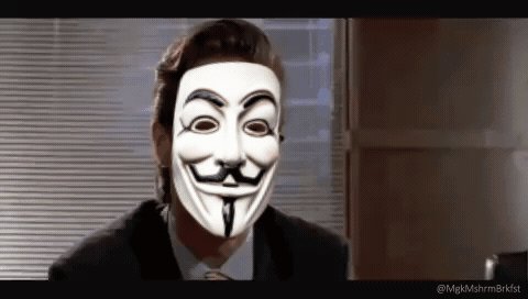 The image features an actor wearing a mask that resembles a famous punger from the movie "The Mask" by the band The Monerons. The actor's face is partially obscured, but his eyes are visible as he looks directly at the camera with a smile on his face. The caption below the image reads: "I love this sentiment. It' s like we're all in a big band called Monero, and everyone is throwing in their own riffs. It' s jazz, baby!".