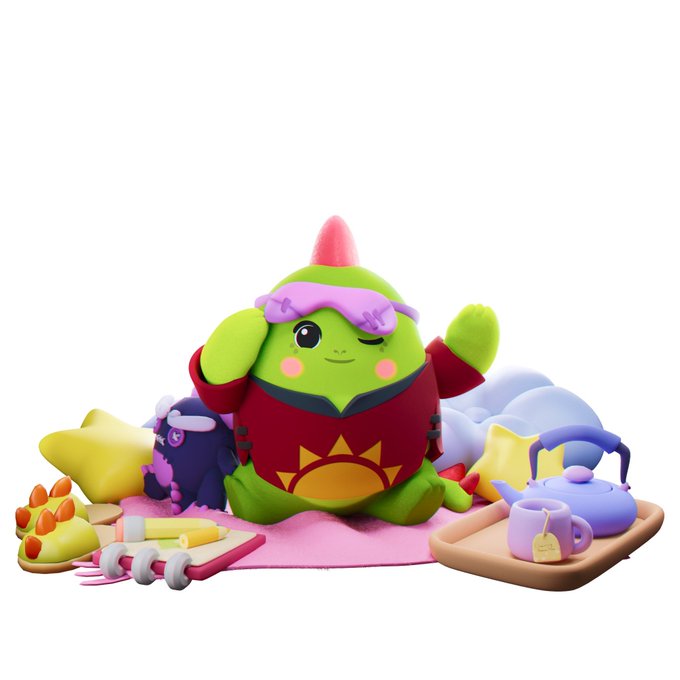 A 3D-rendered figure of a green character with pink cheeks wearing a red outfit with a sun emblem, a pink horn on its head, and purple hair, sitting on a pink mat surrounded by camping/picnic accessories including a teapot, cushions, and food.