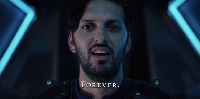 A close-up of an emotional, bearded man saying "Forever." with glowing blue lights framing his face, paired with a post arguing that miners' ability to choose which transactions and software versions to accept creates a flaw giving them permanent control over Bitcoin's network.