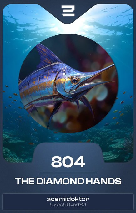 A digital trading card featuring a marlin fish, numbered 804, titled 'THE DIAMOND HANDS', with the user 'acemidoktor' visible.