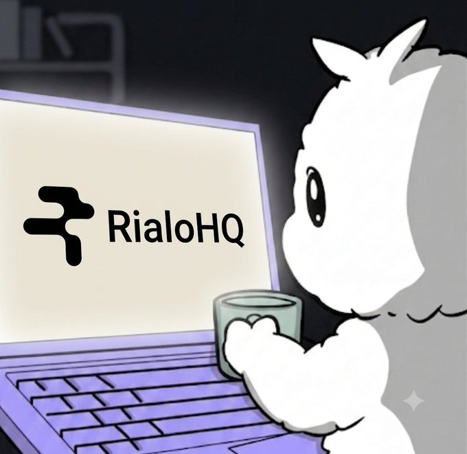 A black and white cartoon character holding a cup while looking at a laptop screen displaying the 'RialoHQ' logo.