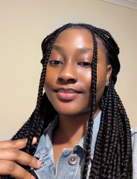 The image shows a young woman with long black box braids wearing a denim shirt. The post appears to be seeking help identifying her, claiming she's a Content KOL (key opinion leader) and offering a $2,000 bounty to whoever finds her, though no name or identifying text is visible in the image itself.