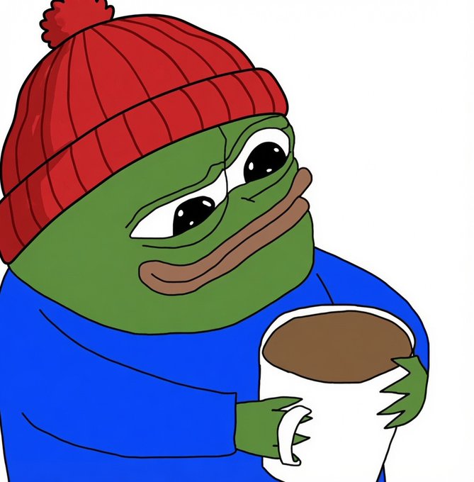 A cartoon illustration of a green Pepe the Frog character wearing a red beanie and blue sweater, smiling while holding a mug of hot cocoa.