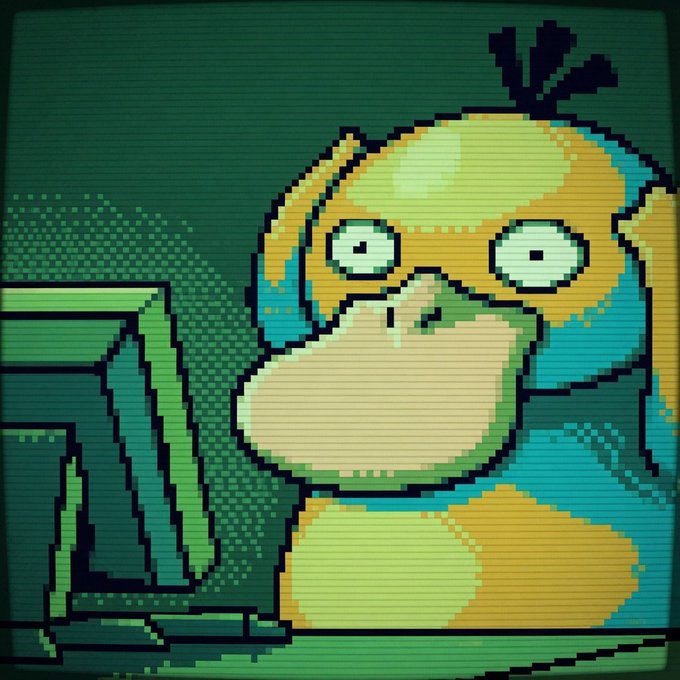 A pixel art image of a cartoon monkey character, featuring yellow and teal coloring, with a CRT monitor effect applied.