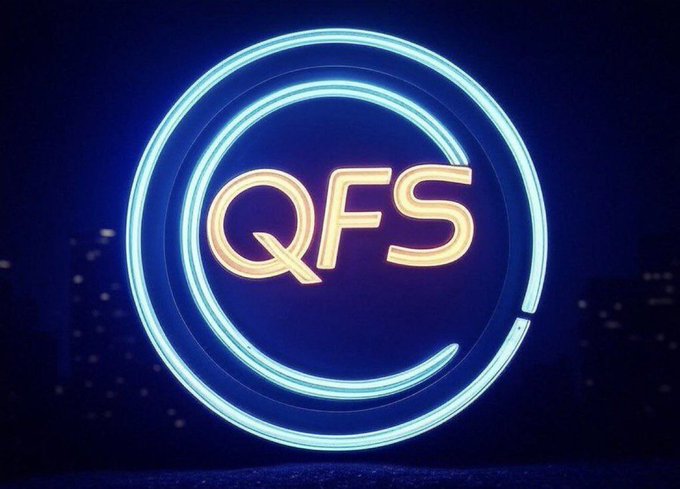 A neon-style logo featuring the text 'QF5' in glowing orange letters encircled by blue neon rings on a dark blue background.