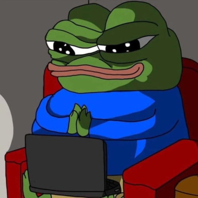 A cartoon illustration of a green Pepe the Frog character wearing a blue shirt, sitting in a red chair while typing on a laptop.