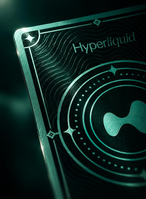 A close-up of a metallic green surface featuring the 'Hyperliquid' logo and decorative patterns.