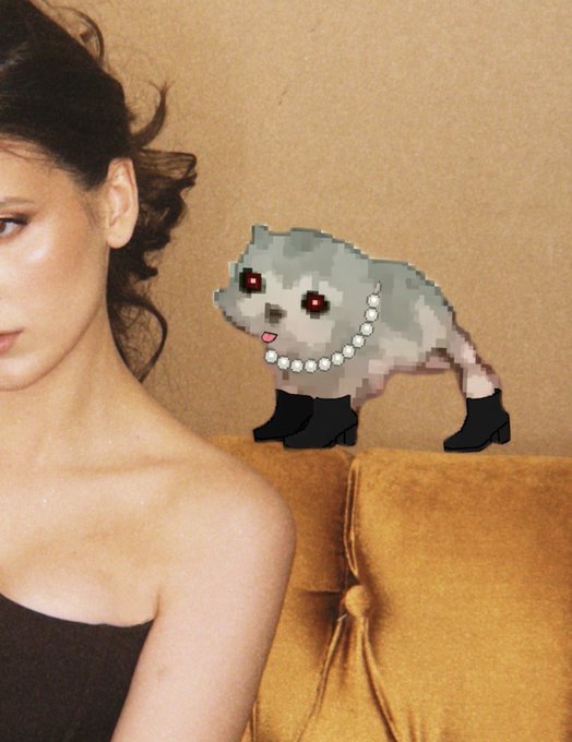 A woman with dark hair poses next to a pixel art illustration of a small grey raccoon wearing a pearl necklace and black boots perched on a mustard-yellow couch.