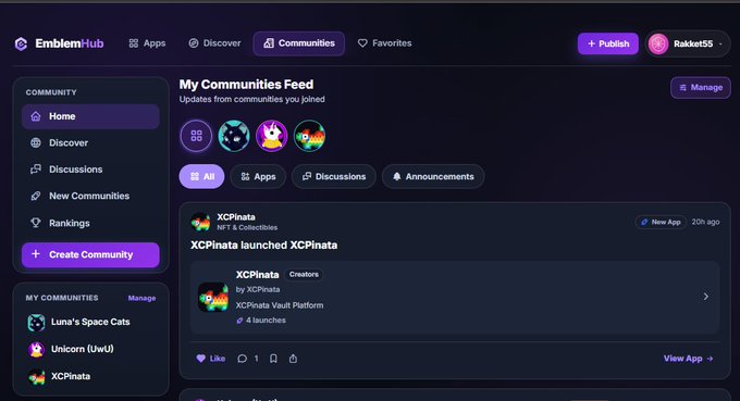A screenshot of the EmblemHub web application dashboard showing a 'My Communities Feed' page with communities like 'Luna's Space Cats', 'Unicorn (UwU)', and 'XCPinata'.