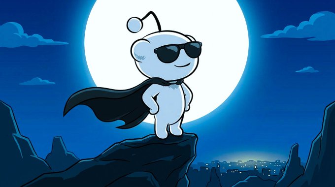 An illustration of a small white character wearing sunglasses and a black cape standing heroically on a cliff against a large full moon with a city skyline below.