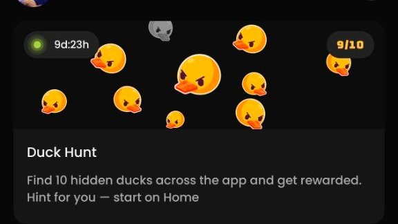 A 'Duck Hunt' game interface showing a timer at 9d:23h and a progress of 9/10, with angry-looking yellow duck emojis and the text 'Find 10 hidden ducks across the app and get rewarded. Hint for you — start on Home'.