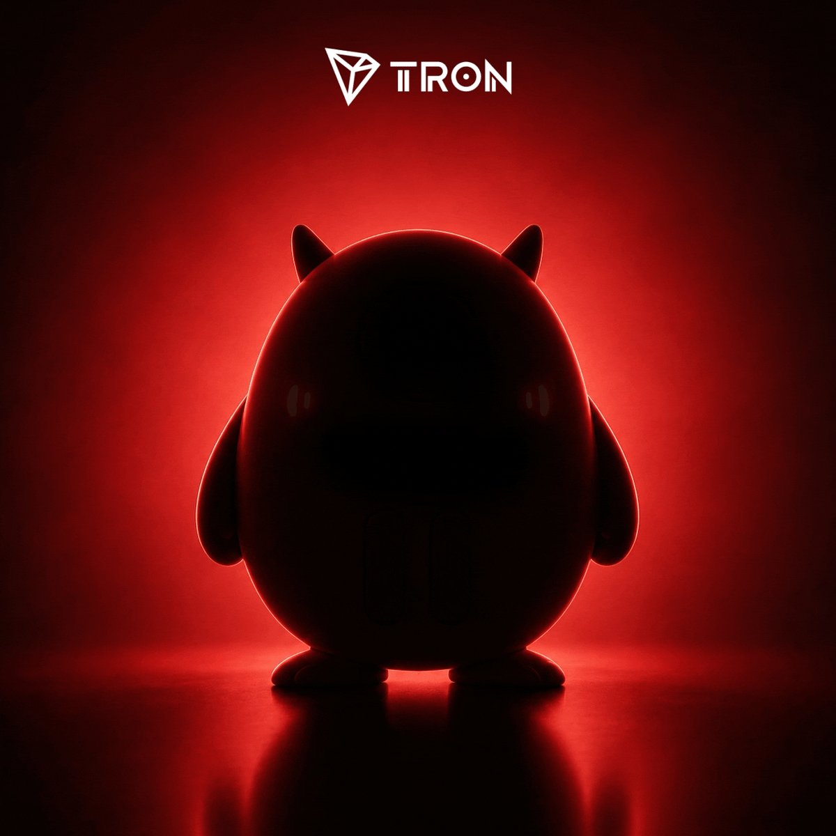 The image features a small, dark-colored toy or figurine of a character with horns standing against a red background. The toy appears to be made from plastic and has a unique design that resembles a monster or a creature. The toy's position in front of a mirror adds an interesting visual effect as it reflects the image back at itself. The post accompanying this image is titled "倒计时1天｜越来越期待见面了—什么样的新朋友—".