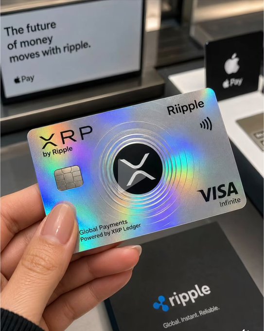 A hand holds an iridescent XRP by Riippie Visa Infinite card, a sleek metal payment card featuring the XRP logo, chip, and the tagline "Global Payments Powered by XRP Ledger," with promotional signage in the background reading "The future of money moves with ripple." The image visually reinforces the post's claim about the future of finance being a simple payment card rather than a crypto app, suggesting XRP's real-world payment utility beyond digital wallets.