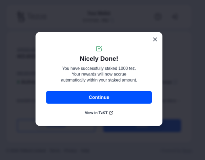 A confirmation pop-up on a digital interface reading 'Nicely Done! You have successfully staked 1000 tez. Your rewards will now accrue automatically within your staked amount.' with a blue 'Continue' button.