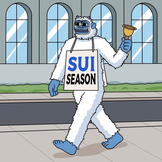 A cartoon illustration of a blue-faced yeti character wearing a 'SUI SEASON' sign around its neck and ringing a bell, walking on a city street.