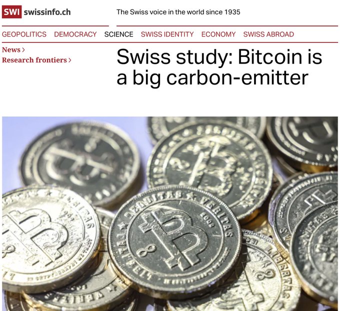 The image shows a stack of gold coins with the text "Swiss study: Bitcoin is a big carbon-emitter." The caption below the image states that Switzerland' public broadcaster @swissinfo_en claimed that Bitcoin emits a lot of energy per transaction, which is not true.
