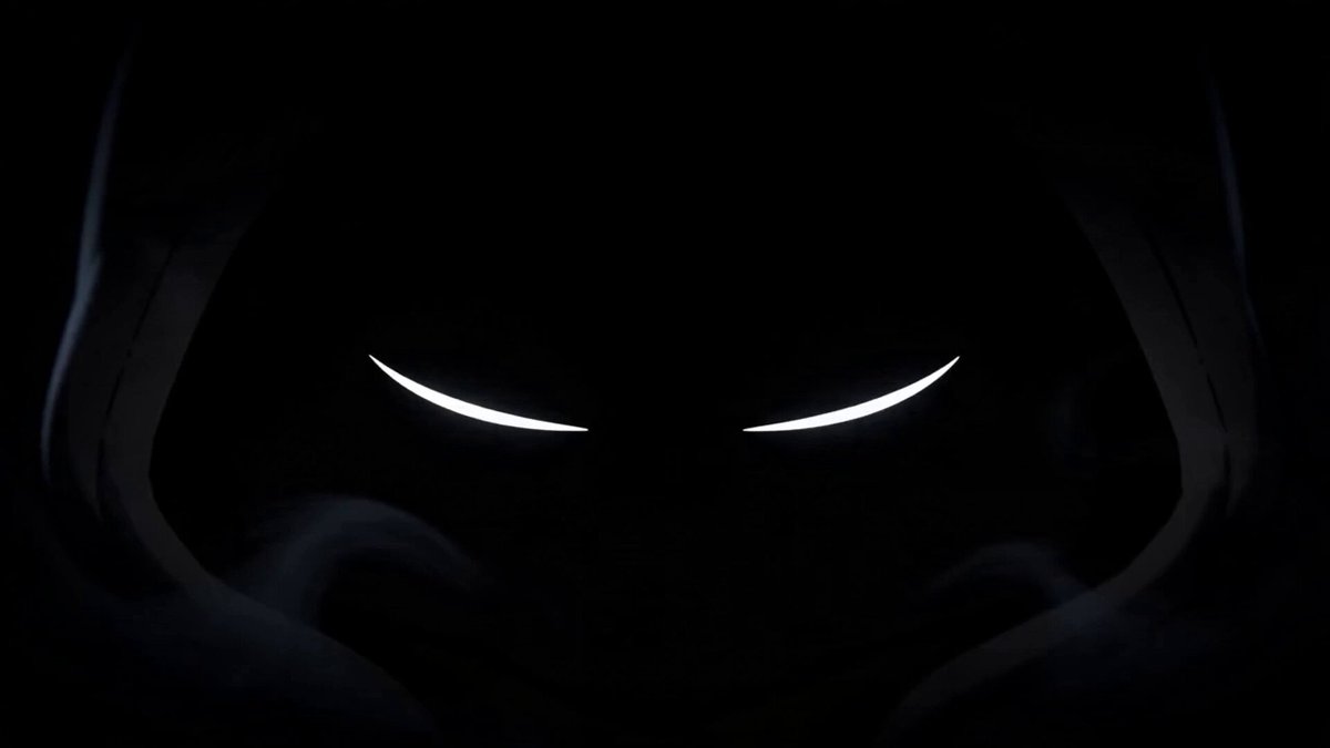 The image features a black and white photo of a hooded figure with glowing eyes, giving off an eerie or mysterious vibe. The background appears to be a dark color, possibly a shade of brown or black, which further emphasizes the stark contrast between light and shadow in the image. The caption below the image reads "The cutest chaos on monad 1000 + 143 supply NFT stay tuned". This phrase is likely an autograph or reference to a specific event or person related to the image.