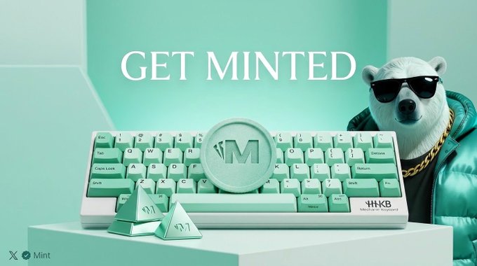 An advertisement for 'GET MINTED' featuring a mint green HHKB mechanical keyboard with an 'M' keycap, alongside a polar bear wearing sunglasses, a puffer jacket, and a gold chain.