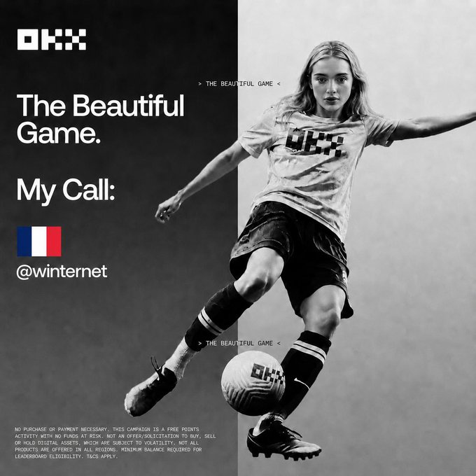 The image features a woman playing soccer, wearing black shorts and a white t-shirt with a logo on it. The background of the photo shows a gray wall, which contrasts with the woman's outfit. In the bottom right corner of the image, there is text that reads "gm everyone' s got a world cup take even those who don't know what the offside rule is (me) but i can still play the beautiful game on @OKX for bitcoin i'm team france". The woman's pose and the presence of the soccer ball suggest she is actively participating in the sport.