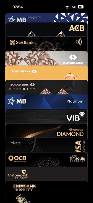 A screenshot of a mobile wallet app displaying a stack of virtual bank cards including MB Priority, ACB, SeABank, Techcombank, VIB Diamond, and OCB Priority.