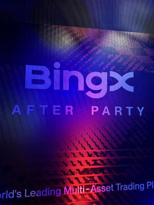 A promotional sign for the BingX After Party, featuring the BingX logo and text describing it as the 'World's Leading Multi-Asset Trading Platform' against a blue and red illuminated background.