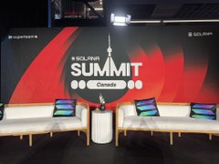 A photo of the 'SOLANA SUMMIT' event display features a red and black background with the logo, alongside white sofas with colorful cushions.
