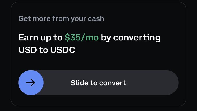 A mobile app interface on a black background displaying the text 'Get more from your cash' and 'Earn up to $35/mo by converting USD to USDC' with a 'Slide to convert' button.