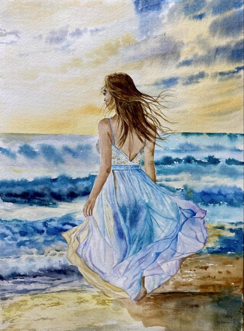 A watercolor painting of a woman with flowing hair in a flowing blue and white dress standing on a beach with waves.