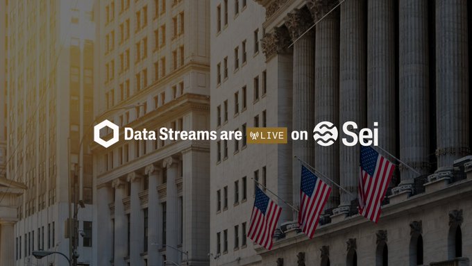 The image shows a backdrop of the New York Stock Exchange building adorned with American flags, overlaid with the text "Data Streams are LIVE on Sei" alongside Chainlink and Sei logos. The visual ties directly to the post's announcement that Chainlink's U.S. Equities Data Streams—covering the $80T U.S. equities market—are now live on Sei, bringing institutional-grade trading data onchain around the clock.