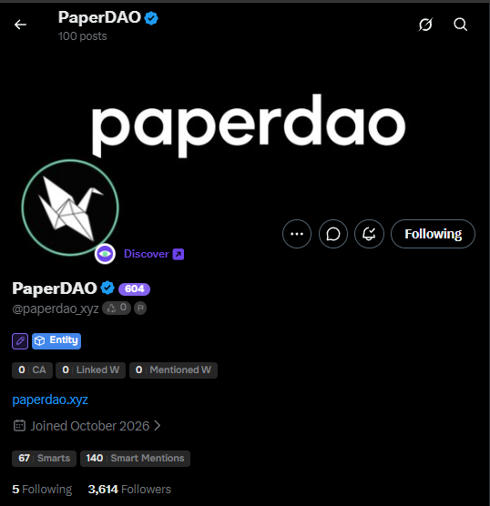Profile page for 'PaperDAO' (@paperdao_xyz) on a social platform, showing a paper crane logo, 604 score, 67 Smarts, 140 Smart Mentions, 3,614 Followers, and joined October 2026.