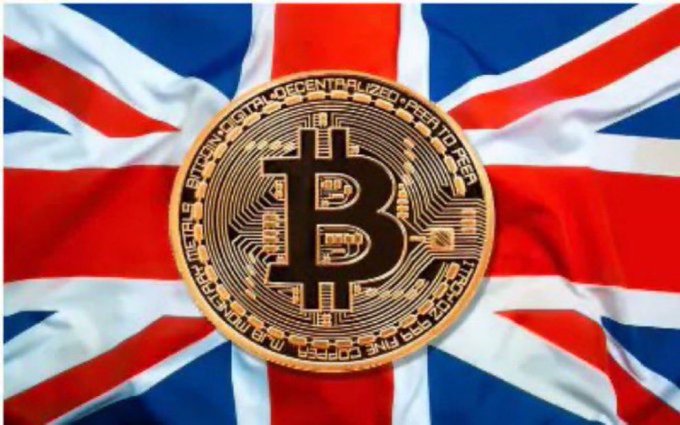 A golden Bitcoin token rests atop a Union Jack flag, visually symbolizing the UK Parliament's recent approval of an amendment urging the government to establish a regulatory framework for Bitcoin and the broader crypto market, as highlighted in the accompanying celebratory post.