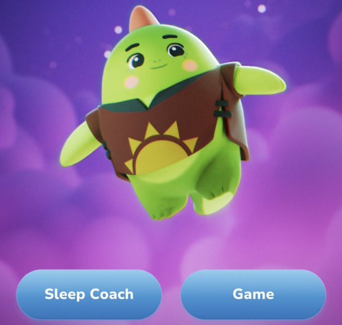 A green cartoon character with a fin on its head and a brown vest floats against a purple background, with two buttons labeled "Sleep Coach" and "Game" below.