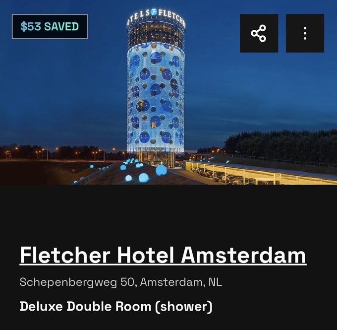 A travel app screenshot showing the illuminated Fletcher Hotel Amsterdam at night with '$53 SAVED' and a listing for a 'Deluxe Double Room (shower)' at Scheepenbergweg 50, Amsterdam, NL.