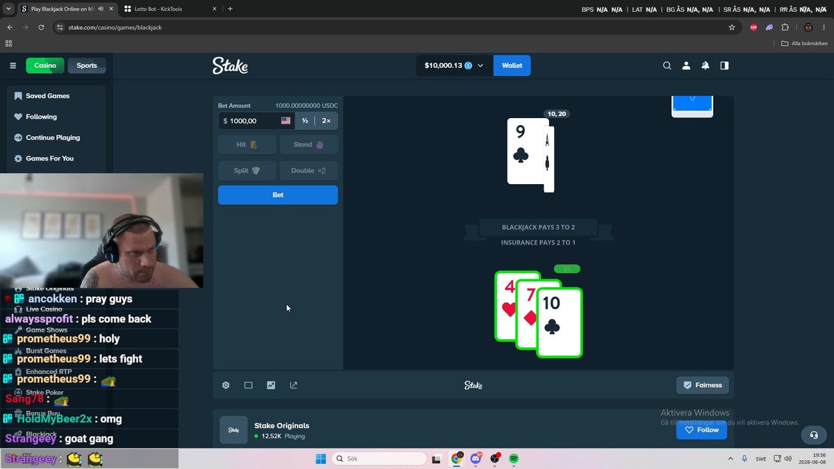 The image shows a computer screen displaying a game interface with three different cards, each representing a player's hand. There are two players visible in the game, one of whom has already made their move. The game appears to be a card game or poker game, as indicated by the presence of playing cards on the screen. The post about Stake users down below goes by the name @Stake and is written in a blue font with white text.