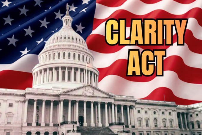 The image features a large American flag with the words "Clarity Act" written above it, along with an illustration of the United States Capitol building. The text suggests that the image might be related to a political campaign or event, possibly discussing the importance of clarity and transparency in government actions.