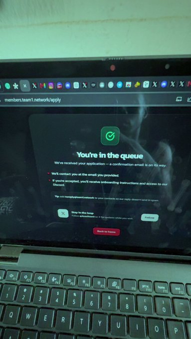 The image shows a laptop screen displaying an error message that reads "You're in the queue". This message indicates that there might be some sort of application or program running, which has caused the user's computer to enter the queue. The context suggests that this could be related to a creator program, such as Avalanche or Creatorverse, where users apply for various creative projects and their applications are put into queues based on factors like project size, priority, or popularity.