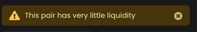 A dark warning notification reads 'This pair has very little liquidity' with a yellow caution triangle icon on the left.