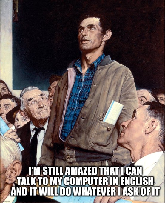 Vintage-style Norman Rockwell painting meme of a man in a plaid shirt looking amazed with the caption: 'I'M STILL AMAZED THAT I CAN TALK TO MY COMPUTER IN ENGLISH AND IT WILL DO WHATEVER I ASK OF IT'.